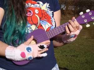 gloves ukulele pink pokemon pokeball red white black gotta catch em all fingerless mittens crochet knitted jigglypuff wigglytuf